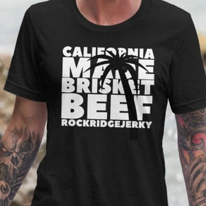 California Made beef brisket t shirt worn by a guy at the beach.