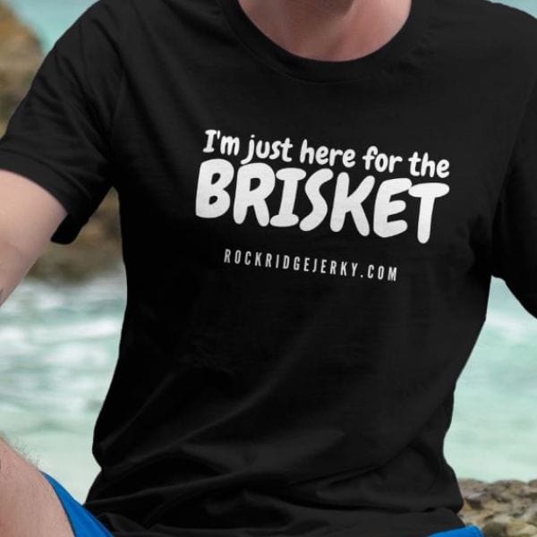 Just here for the brisket beef brisket t shirt worn by a guy at the beach.